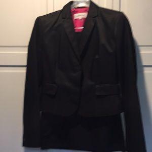 Black Calvin Klein women’s suit.